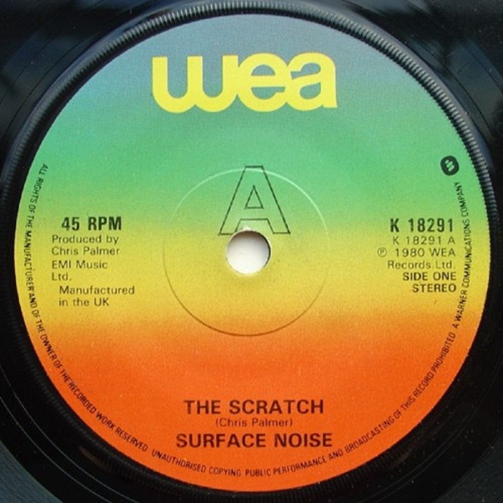 7" 45RPM The Scratch/The Scratch (Alternative Version) by Surface Noise from WEA (K 18291)